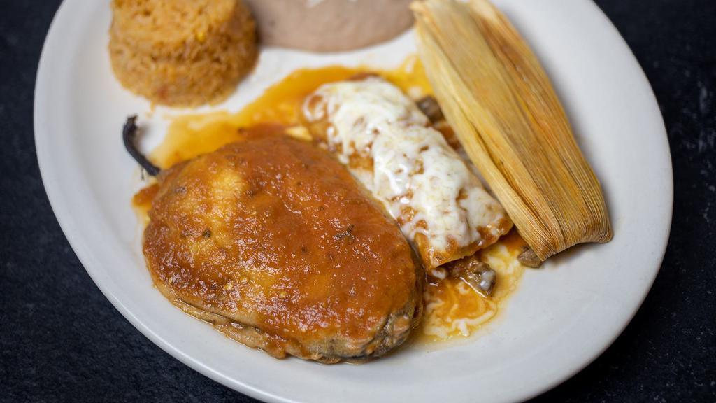 Combinacion 2 · One tamal, one enchilada, one chile relleno. Served with Mexican rice and refried beans.