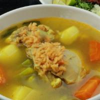 Caldo De Pollo · Traditional chicken soup with vegetables.