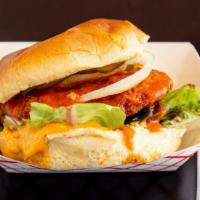 Crispy Chicken · 1/4 pound chicken, house sauce, sautéed onions, mixed greens, pickles, and buffalo sauce.
