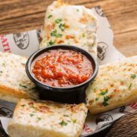 Cheesy Garlic Bread  · 1340 cal. Served with a side of marinara.