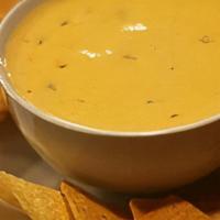 Cheese Dip · Melted Monterey Jack cheese served with fresh tortilla chips