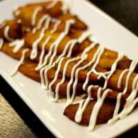 Sweet Plantain · Served with crema drizzled across the top