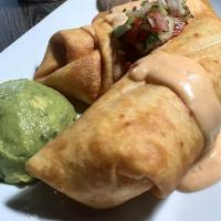 Chimichangas · Fried burritos stuffed with cheese, . beans, and chicken, topped with our delicious cheese s...