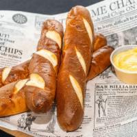 Cheese & Pretzels · House-made cheese sauce, four warm Bavarian pretzels, house-made pickles.