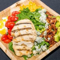 Cobb Salad · Romaine lettuces, grilled chicken breast, fresh avocado, hard-boiled egg, corn, grape tomato...