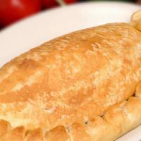 Calzone · Oven baked calzone made from scratch, filled with our special blend of fresh cheese. Served ...