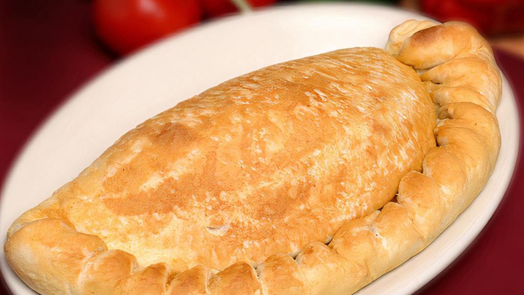 Calzone · Oven baked calzone made from scratch, filled with our special blend of fresh cheese. Served with marinara sauce.
