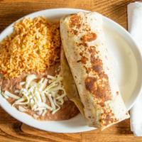 Burrito Dinner · Burrito with your choice of meat. Served with: Beans, lettuce, tomato, cheese, sour cream, &...