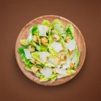 Caesar Salad Special · Fresh crisp romaine lettuce, tossed with Caesars dressing and topped with parmigiano reggian...