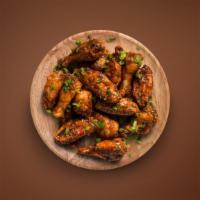 Traditional Chicken Wings (8 Pcs) · Classic bone-in chicken wings in your choice of Ranch, hot sauce or BBQ sauce.