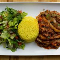 Beef & Veggie Sautee · Tender cuts of Beef sautéed with tomatoes, peppers and onions mixed with spices in a tomato ...