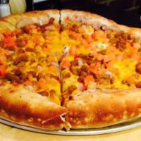 El Taco Pizza · Beef or marinated chicken, refried beans, lettuce, fresh tomato, red onion & cheddar cheese....