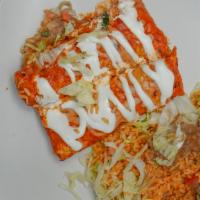 House Enchiladas  · Gluten Free. One choice of meat. 3 com tortillas salsa cheese sour cream