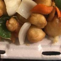 Sweet And Sour Chicken · Battered chunks of chicken breast, bell pepper, onion and carrots, sautéed in a sweet and so...