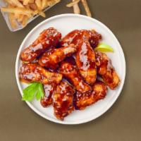 Bbq Boy Wings · Fresh chicken wings breaded, fried until golden brown, and tossed in barbecue sauce. Served ...