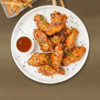 Sweet & Sour Wings · Fresh chicken wings breaded, fried until golden brown, and tossed in sweet and sour sauce. S...