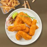 Buff Stuff Tenders · Chicken tenders breaded and fried until golden brown before being tossed in hot sauce.