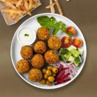 Falafel Fave · Baked and fried mixture of garbanzo beans, fava beans, coriander, cumin, parsley and onions....