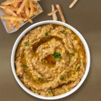 Go For Baba Ghanoush · Mashed grilled eggplant mixed with tahini, lemon, garlic, special seasoning and tahini sauce.