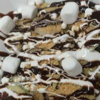 S'Mores Apple Nachos · Sliced apples drizzled with chocolate and marshmallow sauce and topped with crushed graham c...