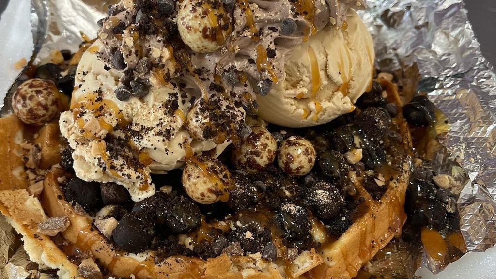 Waffle Sundae - Espresso Brownie · Belgian waffle with espresso ice cream, brownie pieces, caramel drizzle, chocolate covered espresso beans, salted caramel spread.  toffee pieces and whip and oreo coffee sprinkle