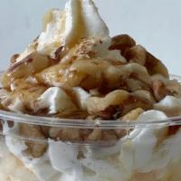 Apple Walnut Sweetie · Vanilla ice cream topped with apple topping, walnuts and maple syrup and a Cinnamon and Suga...