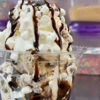 S'Mores Sundae · Campfire S'mores ice cream, topped with marshmallow cream and chocolate syrup, mini marshmal...
