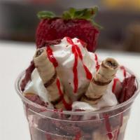 Strawberry Cheesecake Sundae · Strawberry Cheesecake Ice cream, mini cheesecake bites, graham cracker crumb, strawberry, pe...