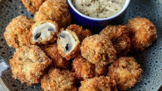 Fried Mushrooms · Seasoned and breaded mushrooms, deep-fried, and served with ranch dipping sauce. Enough for the whole family!
