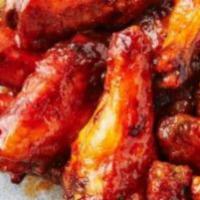 Hot Wings · Ten delicious crispy hot wings, Breaded, seasoned, and deep-fried to perfection. Served with...