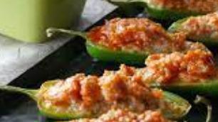 Stuffed Jalapeños · Six jalapeños stuffed with cheddar cheeses, seasoned, breaded, and deep-fried. Served with r...