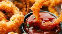 Onion Rings · Eight battered onion rings, breaded, and deep-fried to a golden brown. It's hard to go wrong...