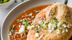 Chili Rellenos · This large, mild poblano pepper is stuffed with cheese, deep-fried and topped with chili and...