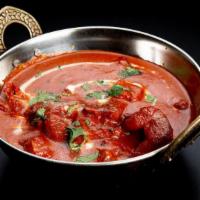 Tikka Masala (Veggie) · Gluten-free and nut free. Cooked in an almond, cashew sauce with rich tomato purée.