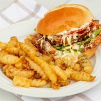 Soft-Shell Crab Burger · A whole crab battered and fried with side of fries

Comes with fries and mango salsa is opti...