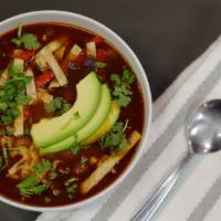 Tortilla Soup · Grilled onions, avocado,bell peppers,  jalapeños,, black beans, cilantro, tortilla strips al...