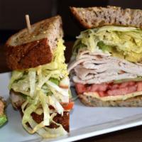California Dreamin Sandwich · Smoked turkey breast, sliced avocado, tomato, lettuce, cucumber, pepper jack cheese, and chi...