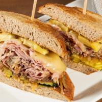 The Cuban · Pulled pork, pork loin, ham, Swiss cheese, grilled onions, pineapple, pickles, hot mustard, ...