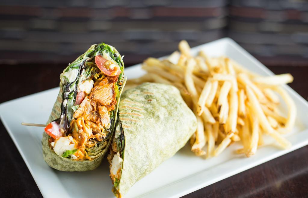 Buffalo Chicken Wrap · Crispy or grilled chicken, mixed greens, bleu cheese crumbles, shaved celery, cherry tomatoes, ranch dressing, spinach flour tortilla