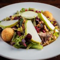 Pear & Goat Cheese Salad · Sliced pear, mixed greens, goat cheese fritters, candied walnuts, dried cranberries, raspber...