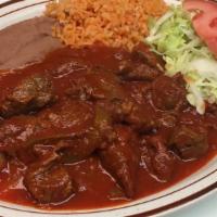 Bistec A La Mexicana · Mexican pepper steak. Tender chunks of steak seasoned with onions, green peppers and tomatoe...