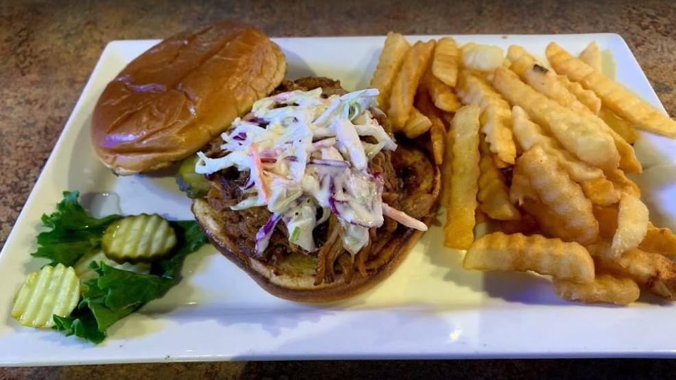Bbq Pulled Pork · House roasted pulled pork grilled in BBQ sauce and topped with coleslaw.
