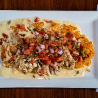 Smothered Chicken Dinner · Cajun seasoned chicken breast grilled with sautéed onions & peppers and corn succotash smoth...
