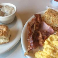 Eggs (2) With Bacon, Hash Browns, Toast, And Jelly Breakfast · Cooked to order: Consuming raw or undercooked meats, poultry, seafood, shellfish or eggs may...