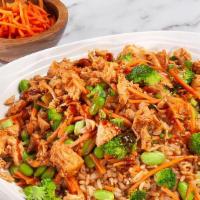 Spicy Teriyaki Chicken Bowl · Made with cilantro brown rice, napa cabbage, honey chipotle chicken breast, steamed shredded...
