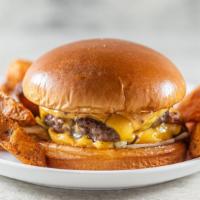 Fancy Burger · double cheese, griddled onions, shredded iceberg, fancy sauce, brioche bun