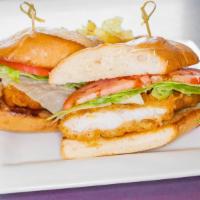 Crispy Walleye Sandwich · Beer battered Canadian walleye served with lettuce and tomato on a hoagie bun, with a side o...