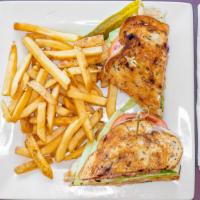 Grilled Turkey Sandwich · Oven roasted turkey breast, Swiss cheese, lettuce and tomato, cranberry mayo on grilled cran...