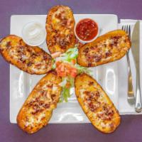 Potato Skins · Six stuffed with cheese and bacon.