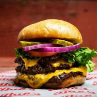 Triple Burger · For those with a huge appetite, Bub's triple burger is made with three- five oz. patties ser...